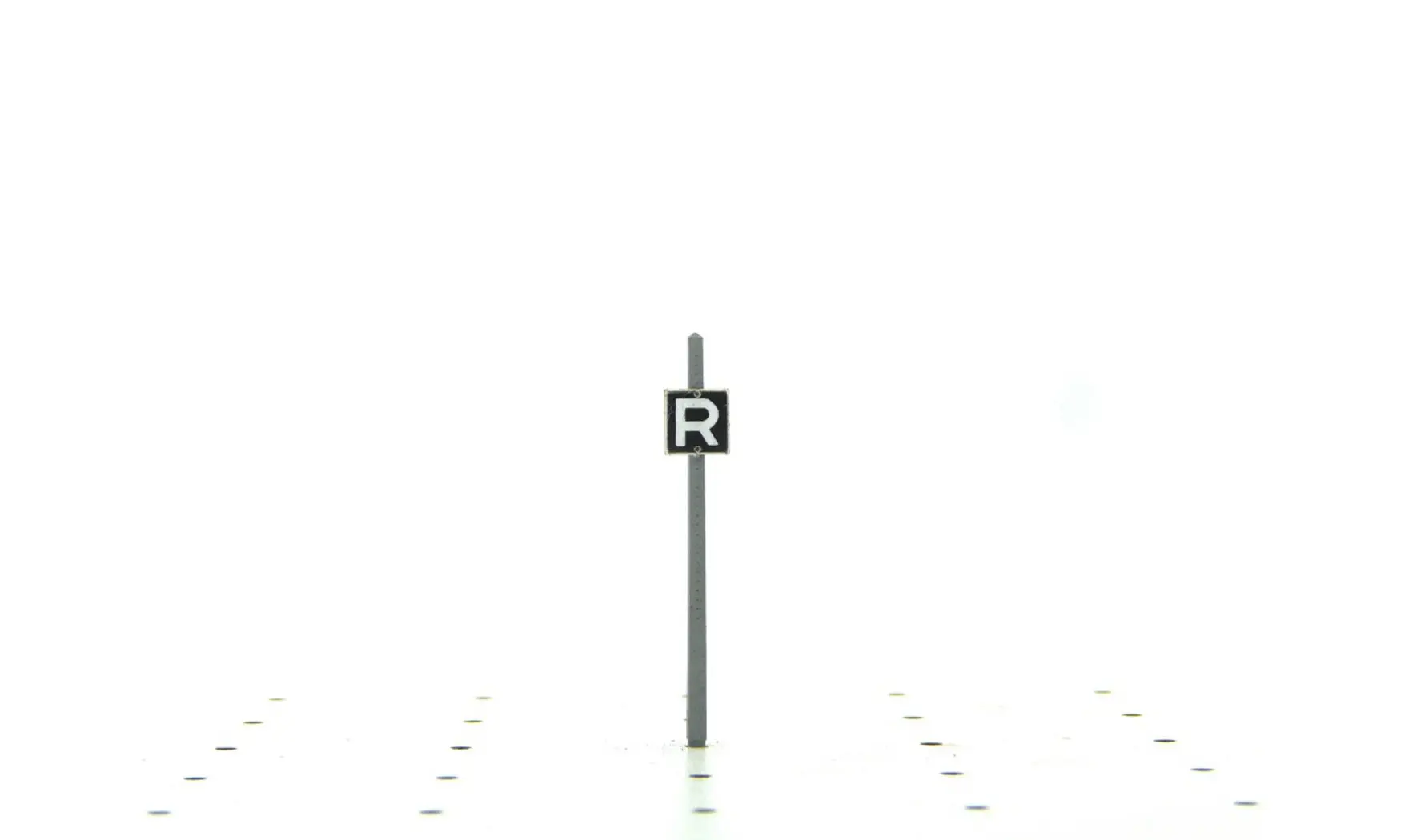 "R" Fin de Limite de Vitesse